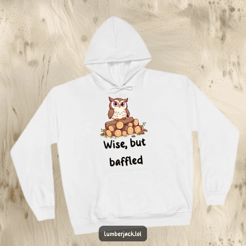 Funny hoodie with a curious owl perched on tiny logs, looking perplexed, a cozy and contemplative woodland animal illustration.